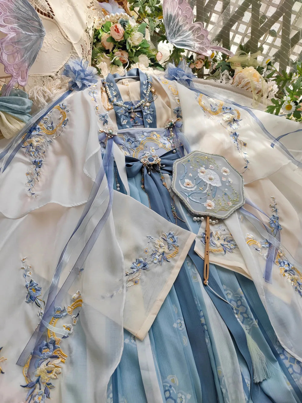 Elegant blue Women's Fairy Hanfu summer costume featuring intricate embroidery and matching accessories.