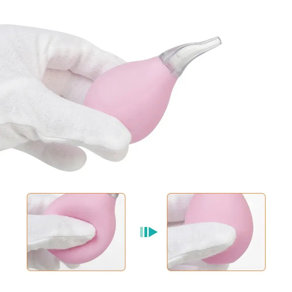 Kids Nasal Aspirator Waterdrop in pink color, held by a gloved hand, ideal for newborn care and nasal health.
