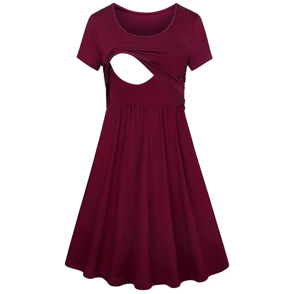 Burgundy knee-length dress with short sleeves and stylish cut-out detail, perfect for casual summer wear.
