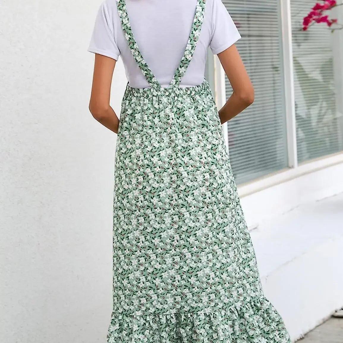 Back view of a floral print comfortable maternity dress, perfect for spring and summer wear.