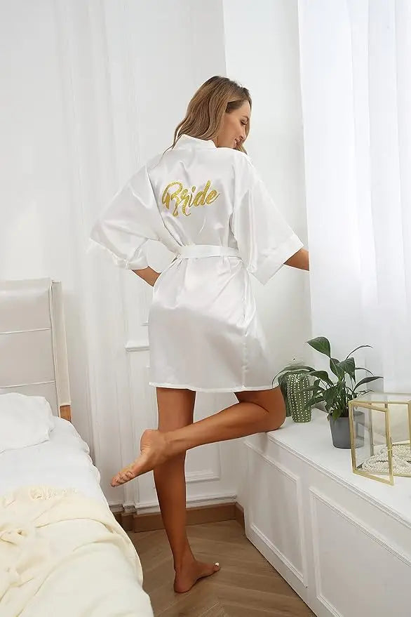 Silk satin bridal robe with 'Bride' embroidery, knee-length, perfect for bridal showers.