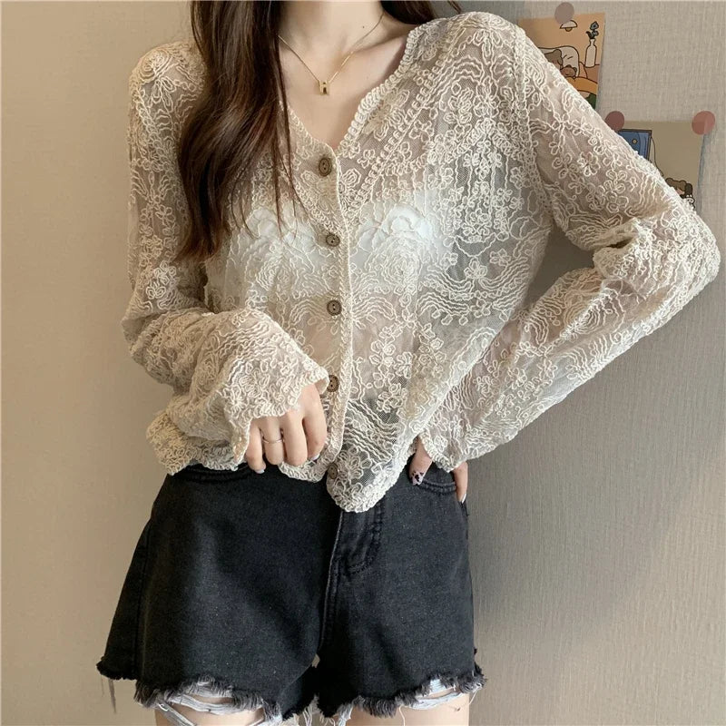 Sheer lace long sleeve shirt with buttons, perfect for summer styling and a loose fit.