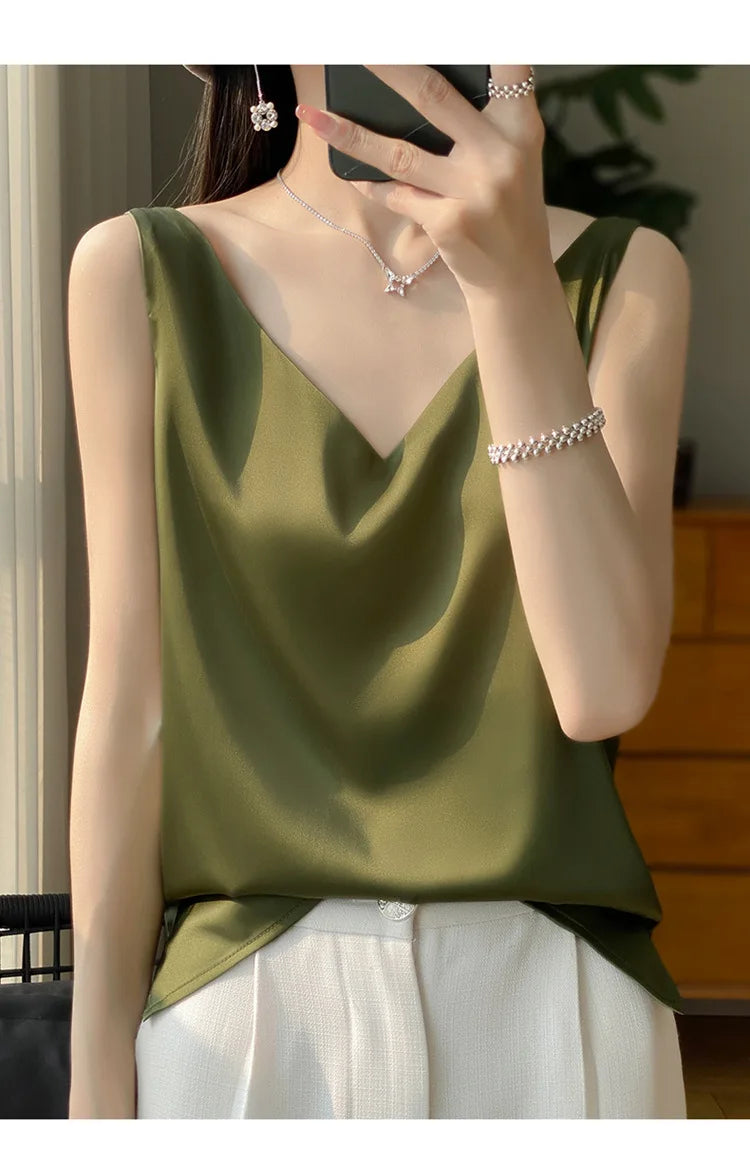 Olive green satin v-neck camisole top for women, perfect for summer styling and casual elegance.