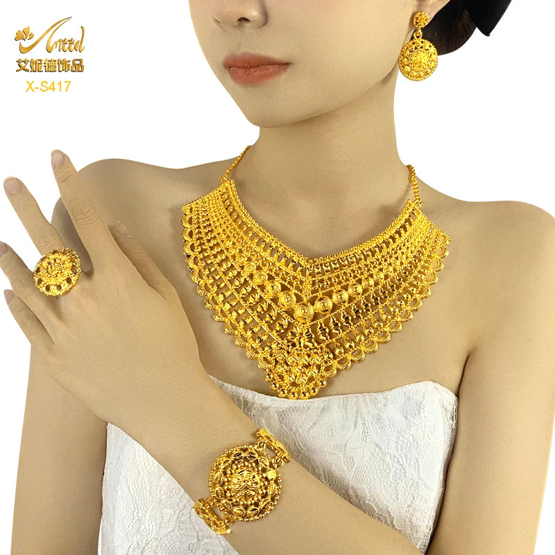 Luxury Indian bridal jewelry set featuring 24K gold-plated necklace, earrings, ring, and bracelet for weddings.