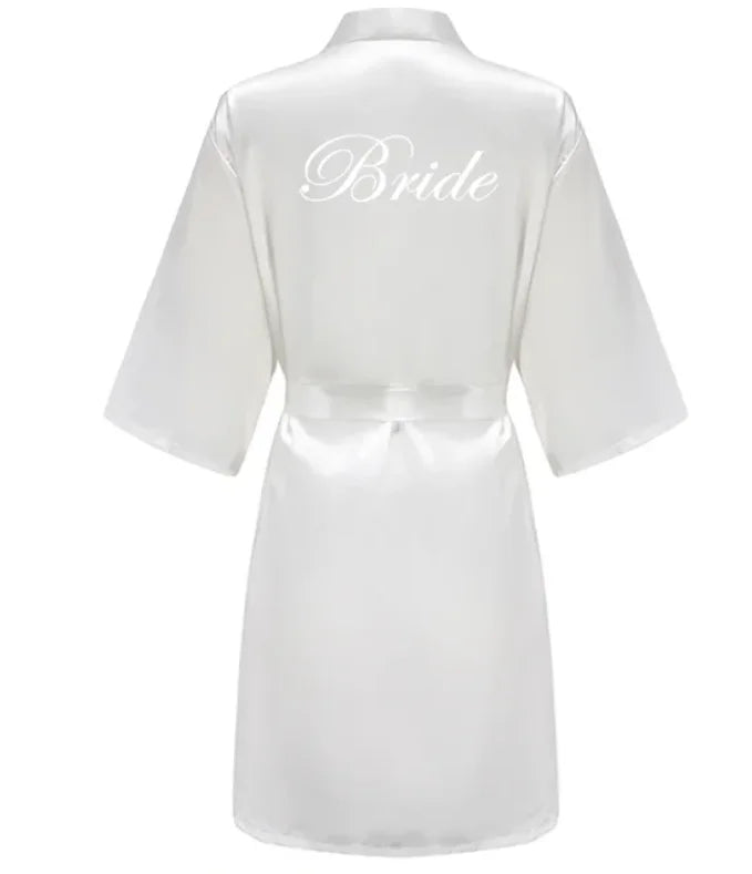 Elegant satin robe for brides featuring 'Bride' embroidery, perfect for wedding day preparation.