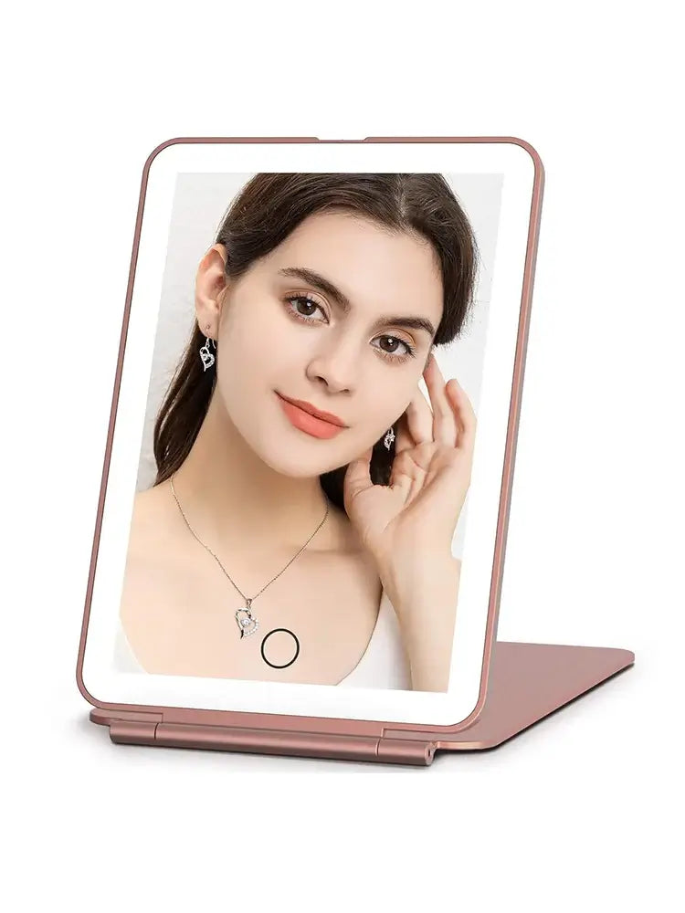LED foldable travel makeup mirror in use with a woman showcasing earrings and necklace, USB rechargeable design.