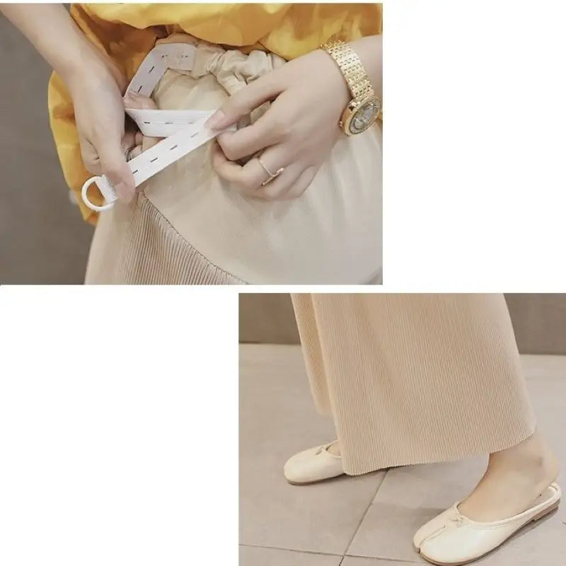 Woman adjusting breathable adjustable waist maternity pants, showcasing loose fit and natural summer style.