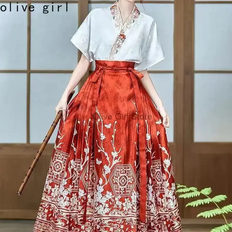 Traditional Hanfu oversized embroidered blouse featuring a white top and a red patterned skirt, perfect for women.