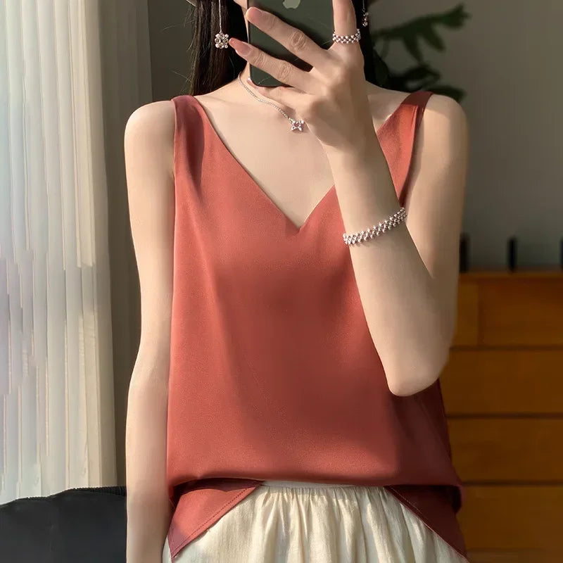 Model wearing a stylish V-neck camisole, showcasing the elegant design and soft fabric, suitable for all-season wear.