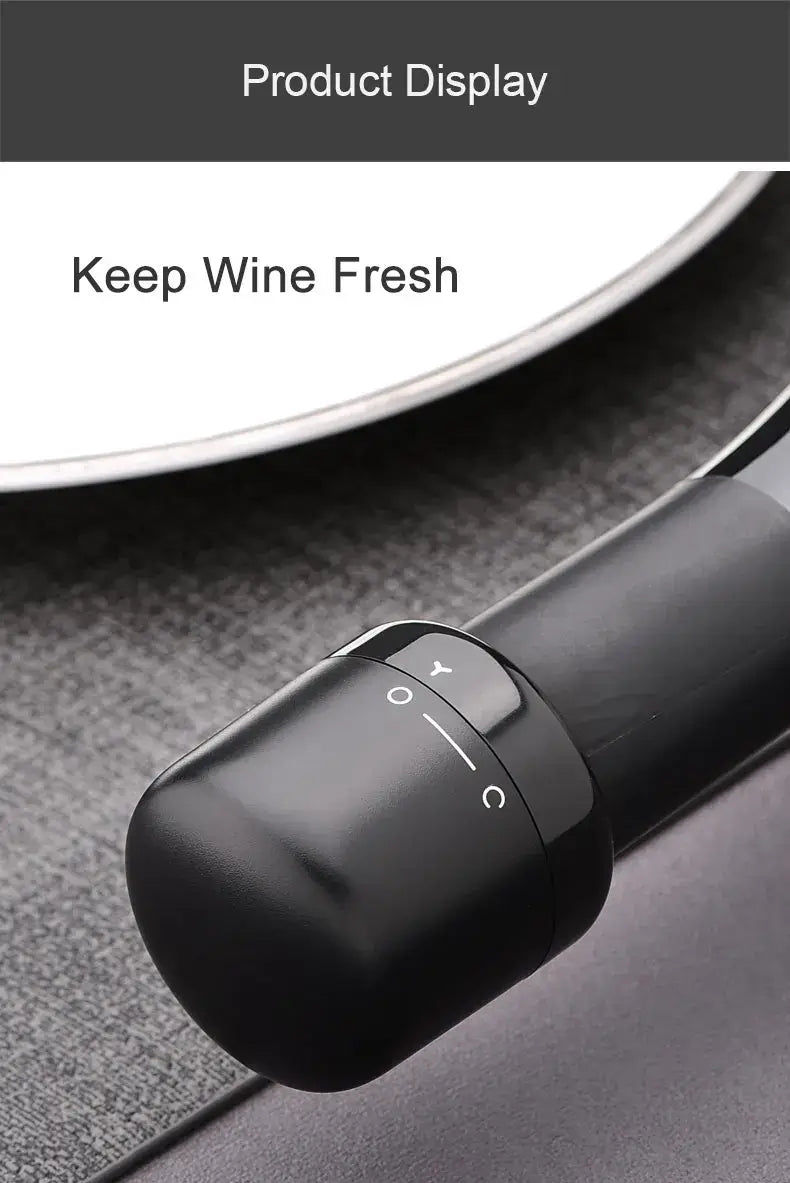 Vacuum red wine bottle cap stopper for keeping wine fresh, featuring a sleek black silicone design.