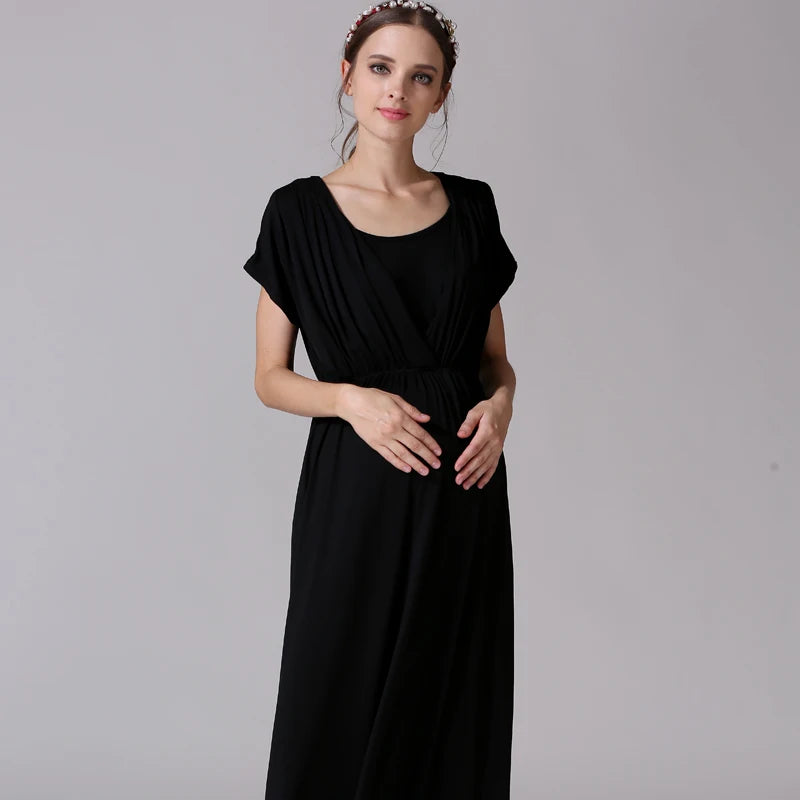 Soft fabric black maternity nursing dress for women, featuring a v-neck and mid-calf length, ideal for breastfeeding.