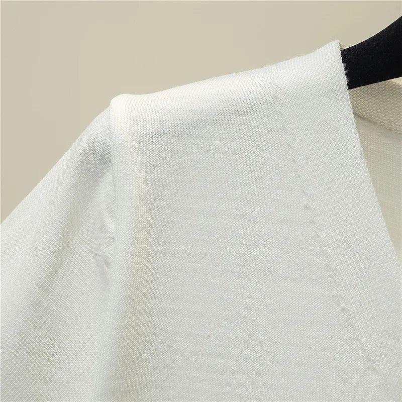 سترة نسائية محبوكة بأكمام قصيرة