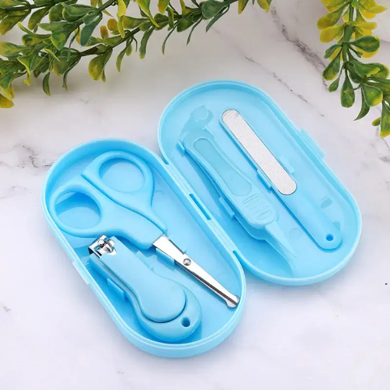 Baby children's nail clipper kit in blue case, including scissors, clipper, and nail file for safe grooming.