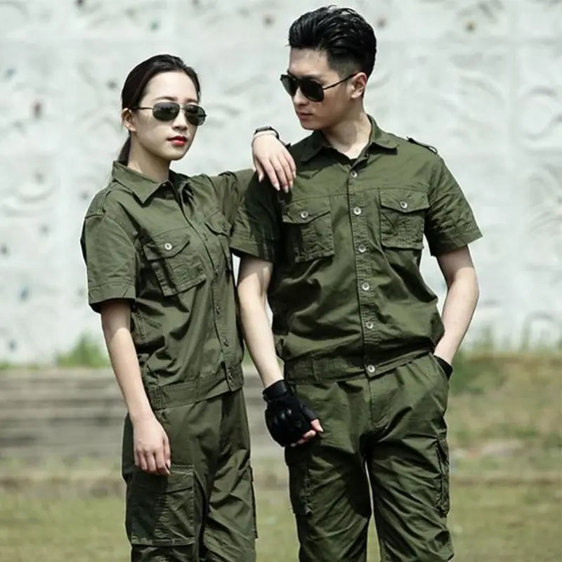 Two models wearing a summer green cotton work suit designed for welding protection, showcasing functionality and style.