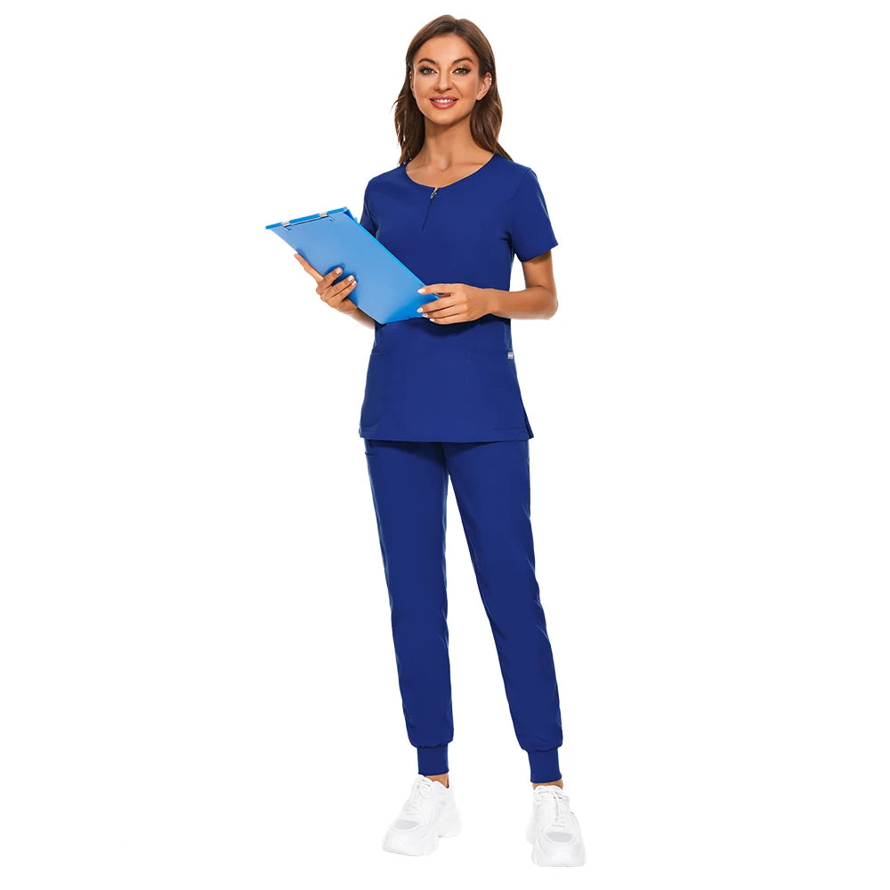 7-color nursing work uniform featuring zipper v-neck top and pants, worn by a woman with a clipboard.
