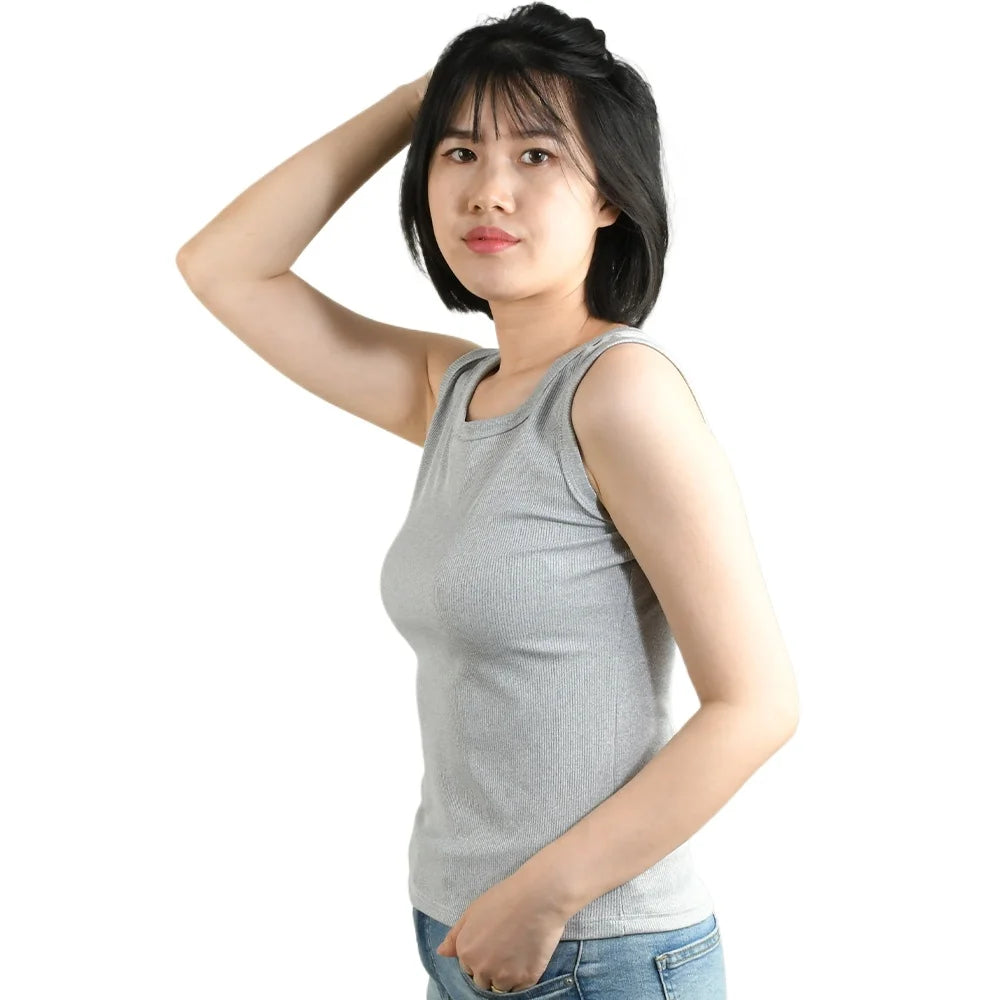 Woman wearing SlipFit™ anti-slip invisible cami in gray, showcasing summer comfort and slimming fit.