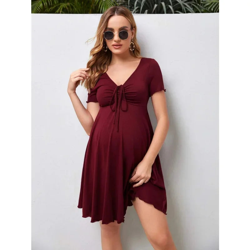 Pure Color V-Neck Maternity Dress in maroon, perfect for summer, featuring a knee-length A-line silhouette and short sleeves.