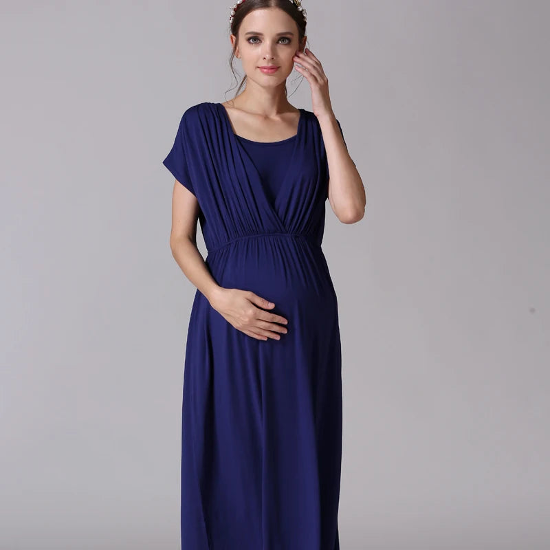Soft fabric nursing maternity dress in navy blue, featuring a v-neck and pleated design, ideal for postpartum and breastfeeding.