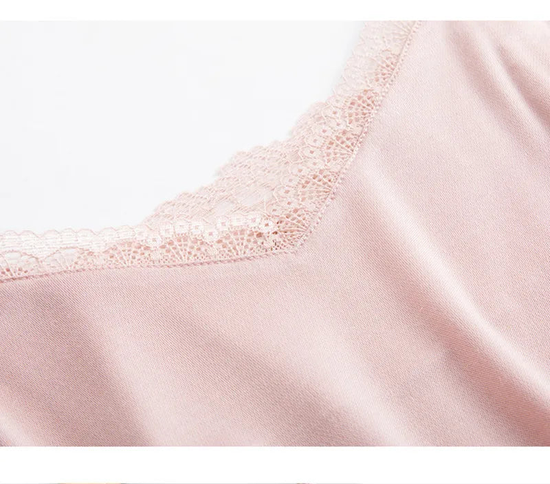 Close-up of LuxeLace™ silk camisole tank top featuring delicate lace trim and V-neck design.
