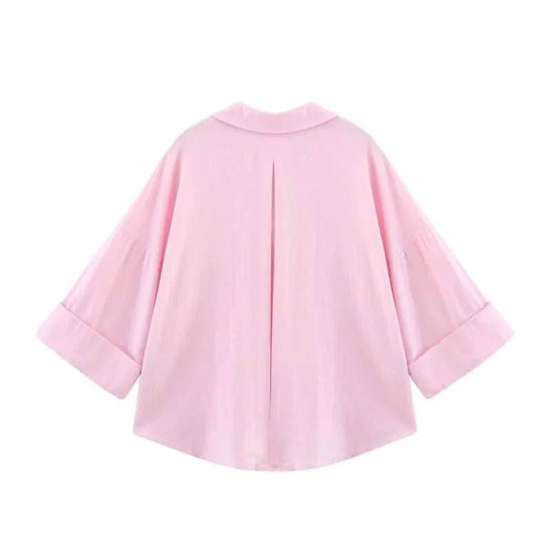 Back view of AsymLinen™ wide sleeve linen shirt in pink, featuring a turn-down collar and loose fit.