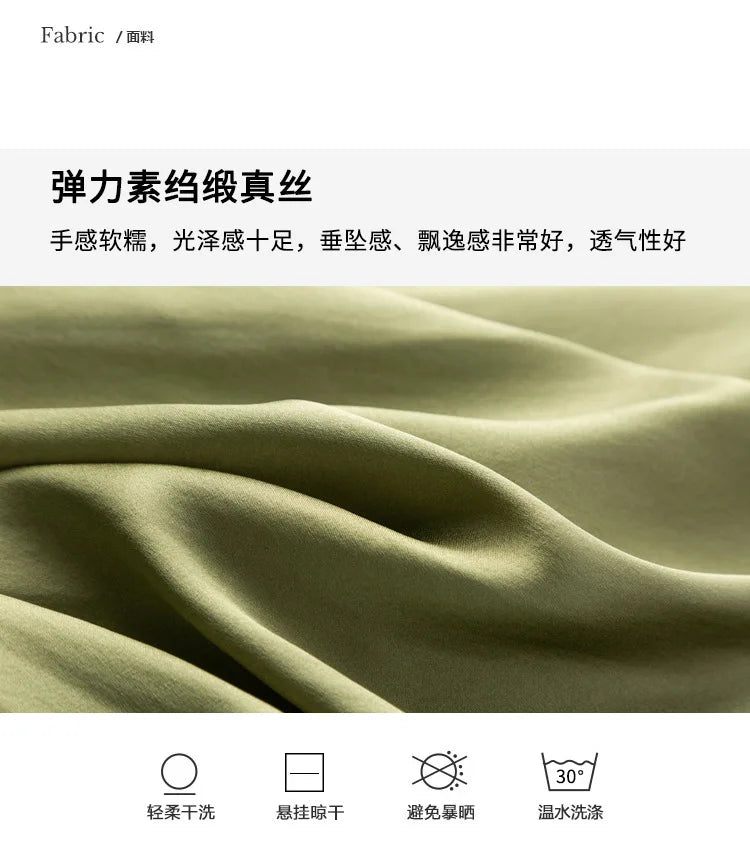 Close-up of soft, stretchy satin fabric in olive green, showcasing its luxurious texture and feel.