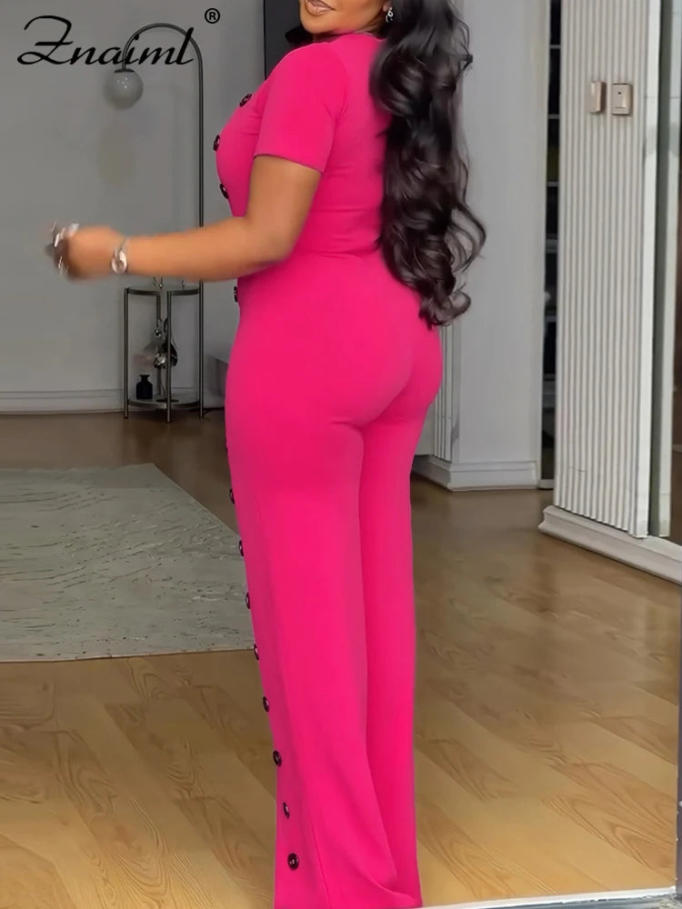 ElanWide™ – جمبسوت بأكمام قصيرة وساق واسعة (أنيق، منسدل، ولامع)