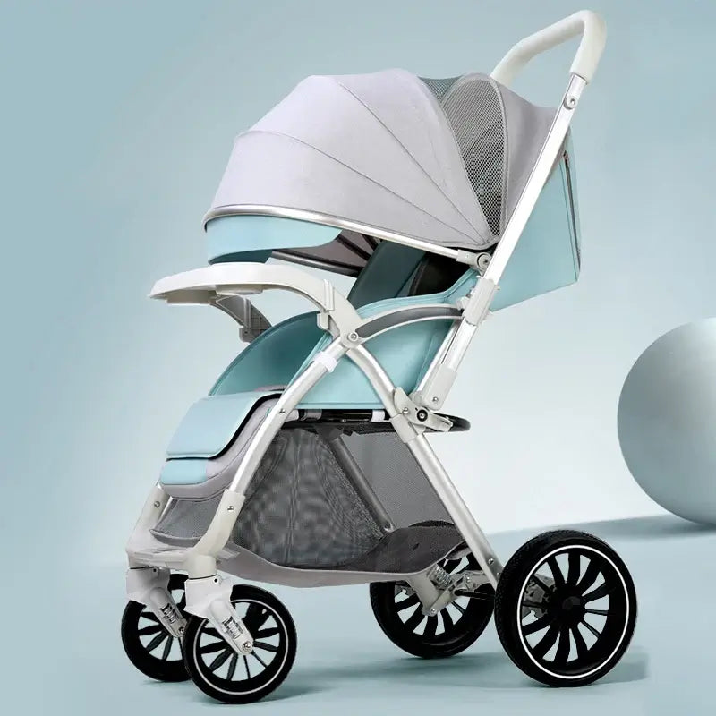 Bi-directional high landscape baby stroller in blue and grey with lightweight frame and large wheels for easy travel.