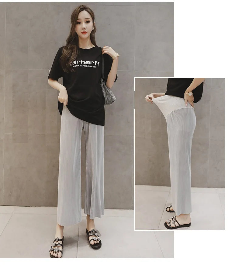Breathable adjustable waist maternity pants in natural gray color, featuring a wide leg design, ideal for summer wear.