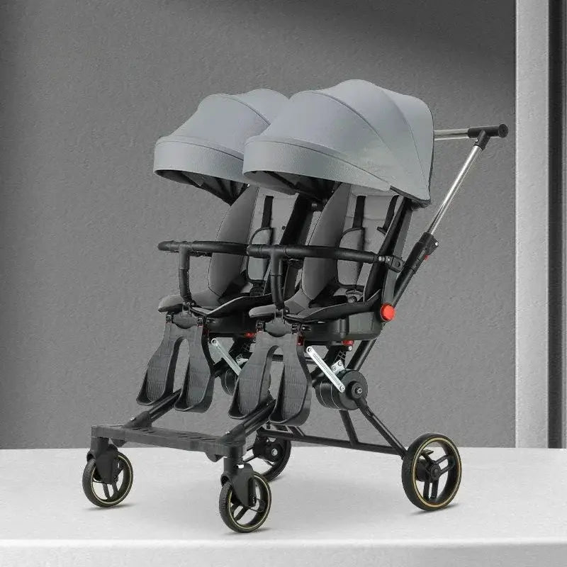 Twin strollers designed for two children, featuring foldable design and recycled fabric, suitable for ages 6 months to 3 years.