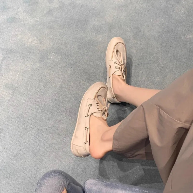 أحذية نسائية بدون كعب - حذاء مسطح برباط من الجلد الطبيعي 2025