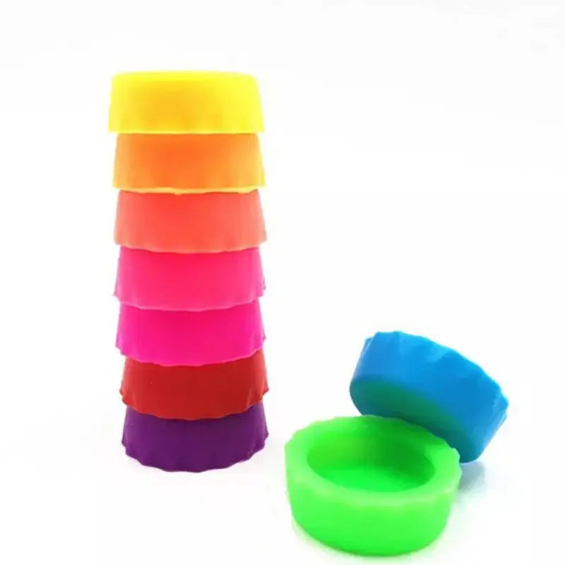 Colorful 6pcs silicone wine bottle caps stacked, reusable caps for wine preservation.