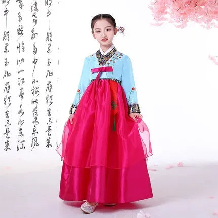 Traditional Korean Hanbok dress for girls featuring blue and pink colors, perfect for cultural events and dance performances.