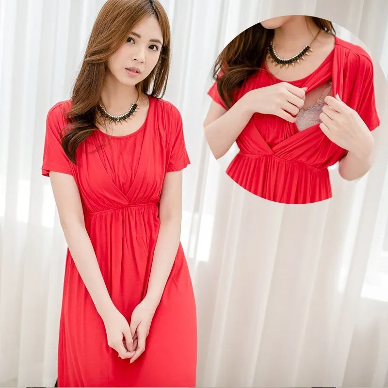 Soft fabric maternity dress in red with breastfeeding feature, designed for comfort and style for postpartum moms.