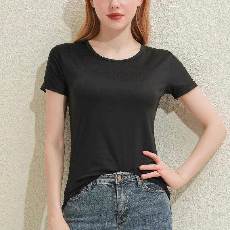Slim fit black cotton tee for women, featuring short sleeves and a round neckline, perfect for casual summer outfits.