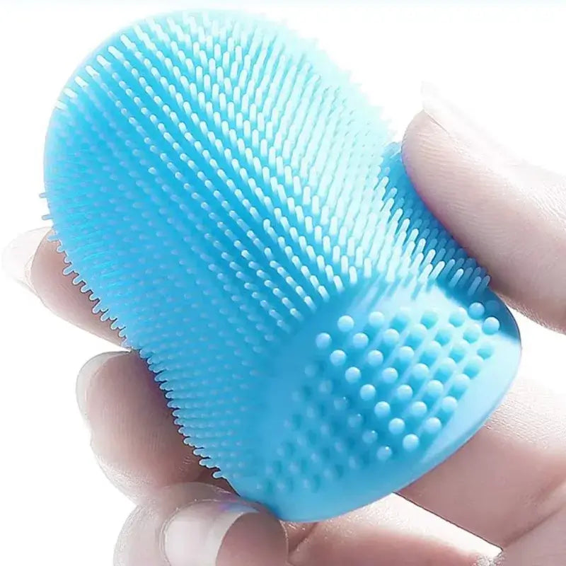 Blue silicone bath brush designed for newborns and infants, perfect for gentle cleaning during bath time.