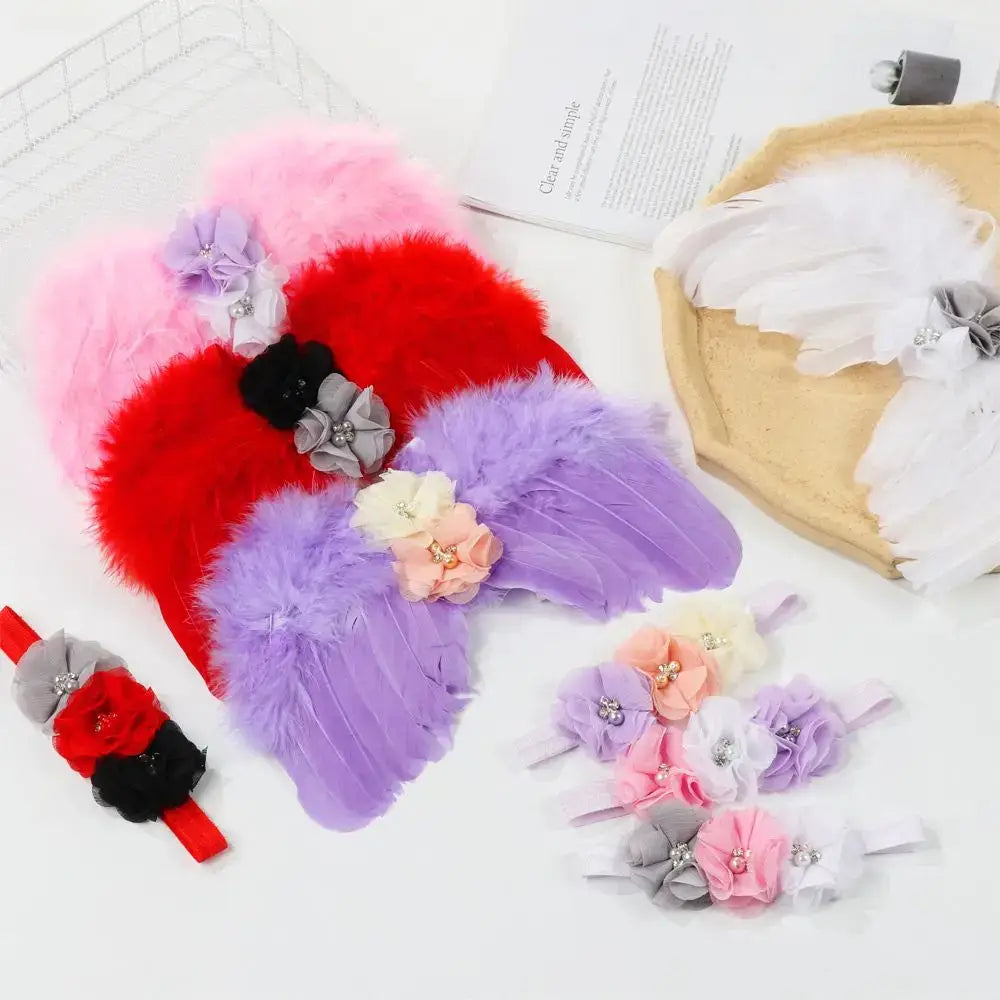 Cute newborn angel feather wings in various colors with matching flower headbands for baby girls.