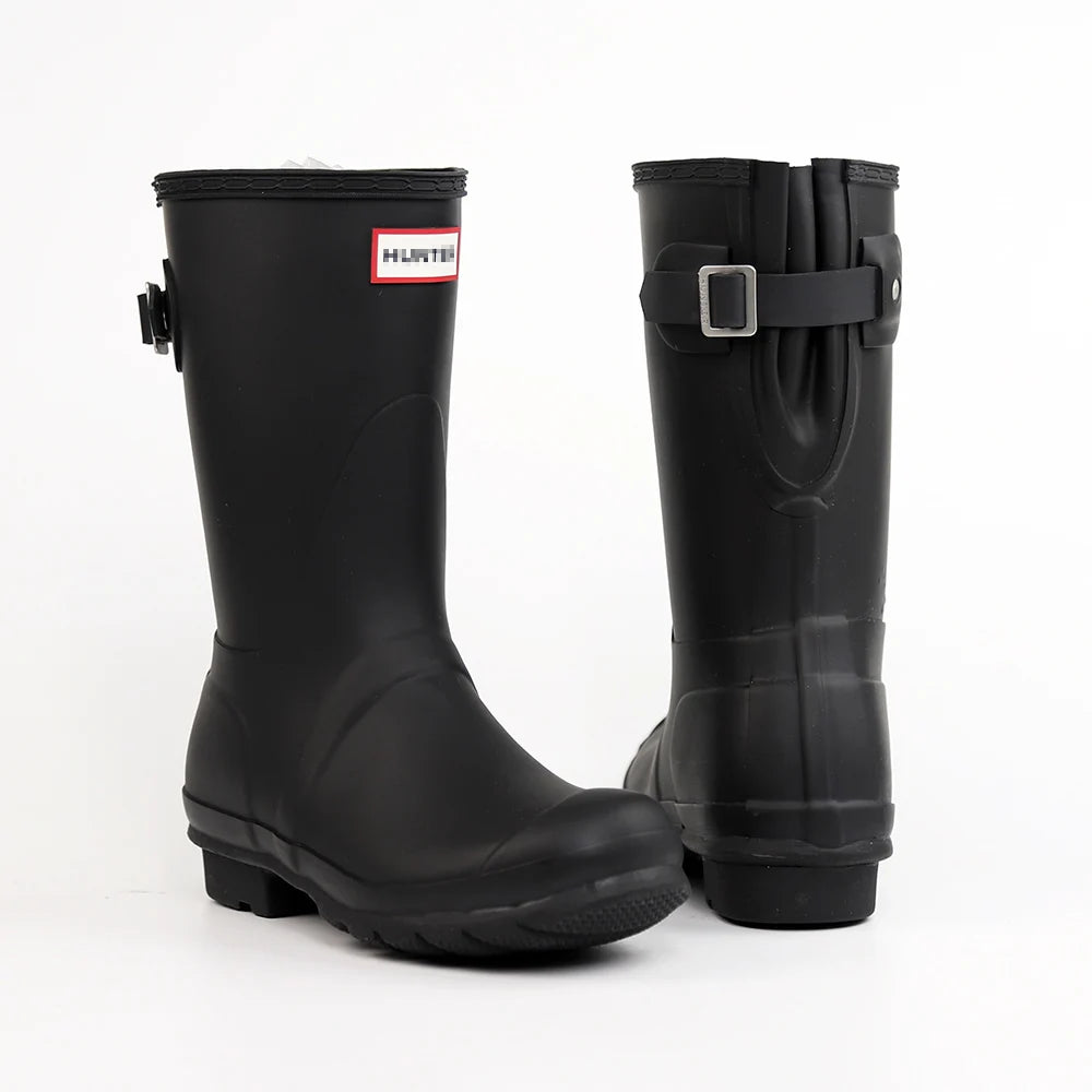 حذاء نسائي من الجلد المطرز حتى منتصف الساق