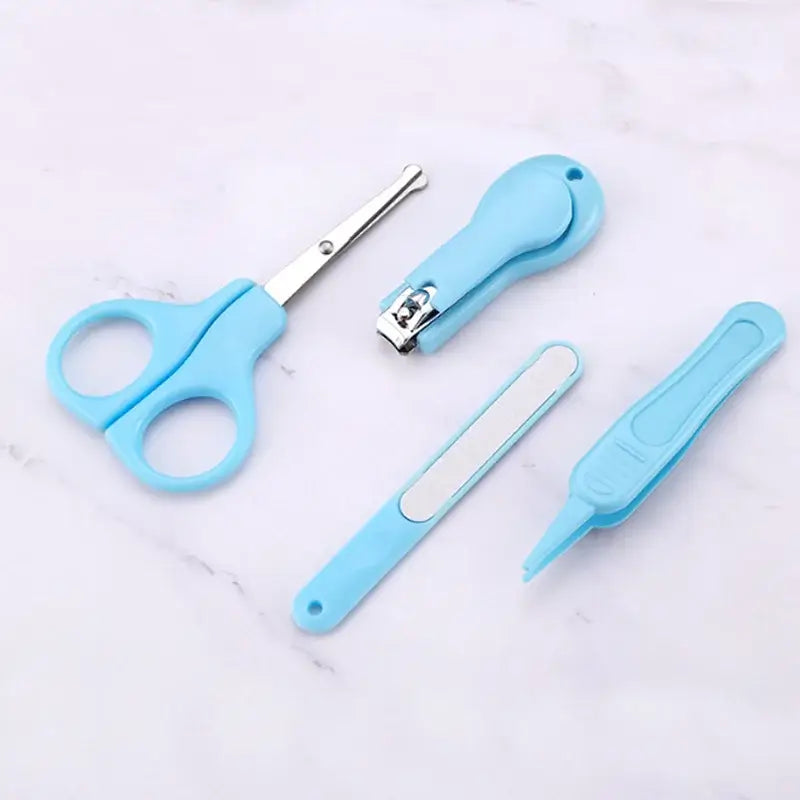 Baby children's nail clipper set including scissors, nail clipper, file, and pusher in blue color, safe for babies.