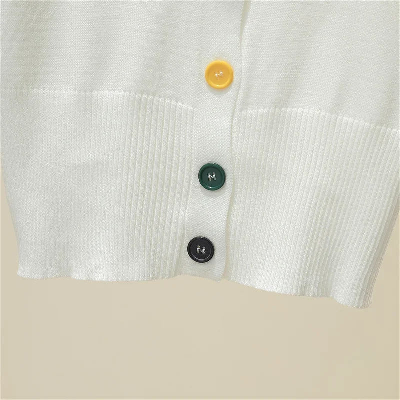 سترة نسائية محبوكة بأكمام قصيرة