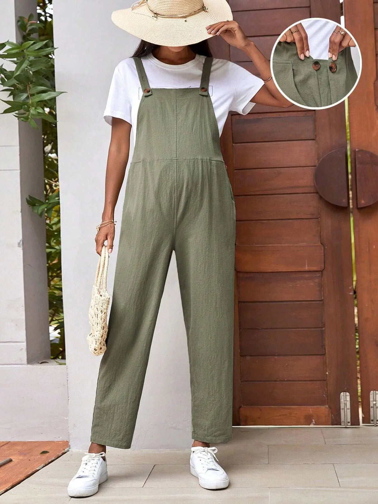 Adjustable maternity overalls in olive green, featuring loose fit and straps, perfect for comfortable summer wear.
