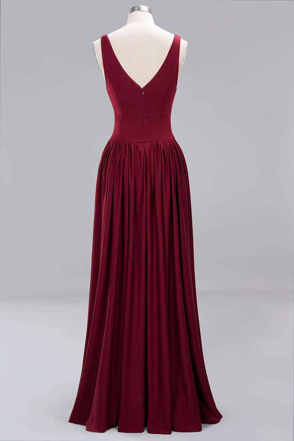 Back view of a burgundy bridesmaid evening gown with a V-neck and pleated floor-length skirt.