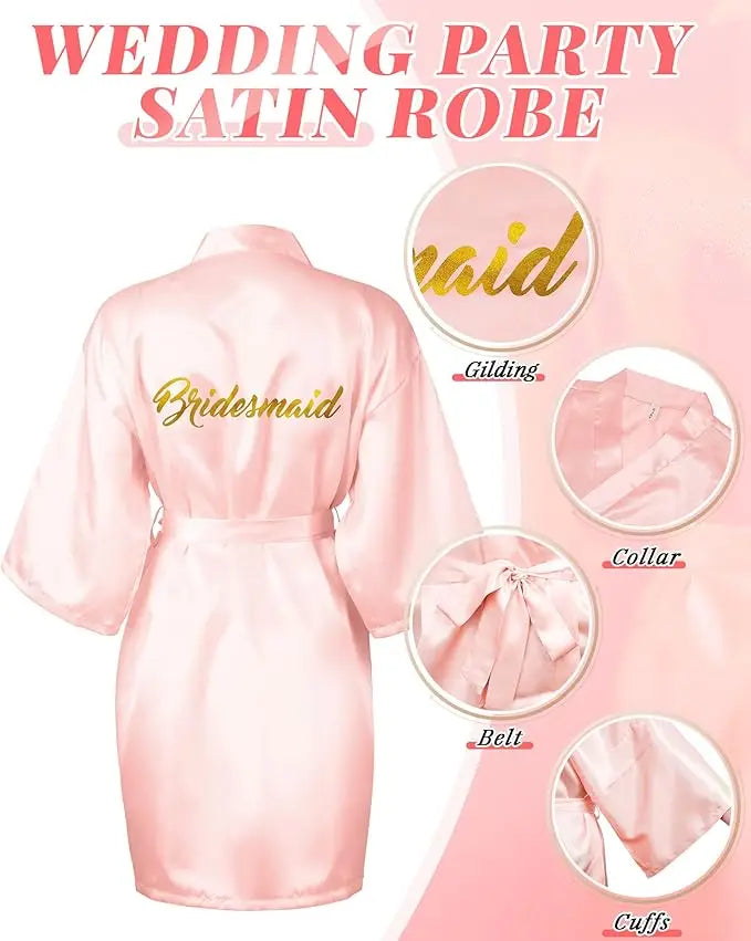 Pink satin bridesmaid robe featuring gilded lettering, collar, belt, and cuffs for wedding party elegance.