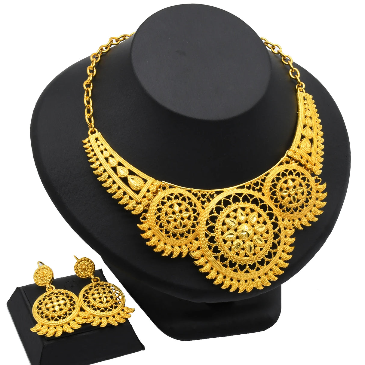 Luxury Indian bridal jewelry set featuring a 24K gold plated necklace and matching earrings, perfect for weddings.