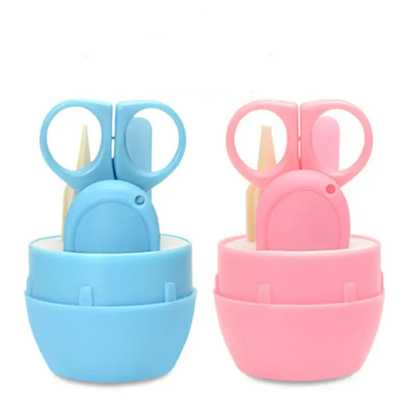 Newborn baby nail scissors in blue and pink, designed for safe grooming of infants aged 0-6 years, cartoon pattern.