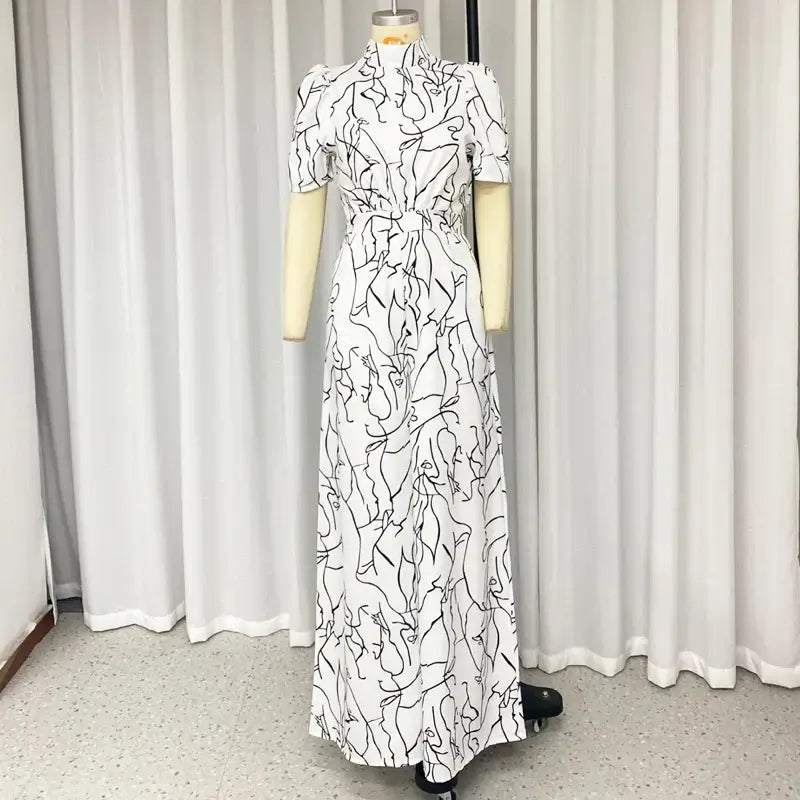 جمبسوت نسائي واسع الساق بطبعة فنية