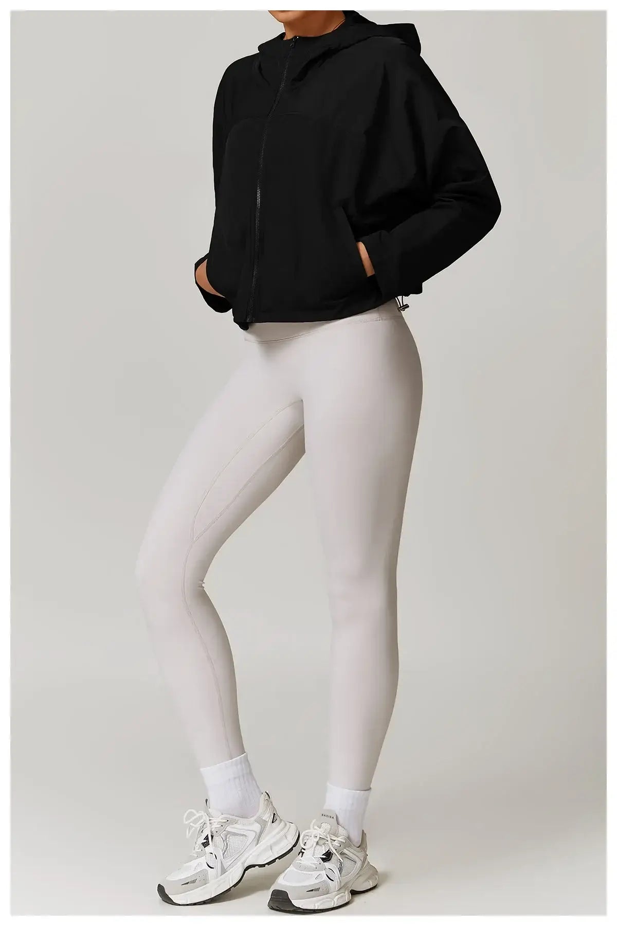 سترة رياضية نسائية سريعة الجفاف بغطاء للرأس