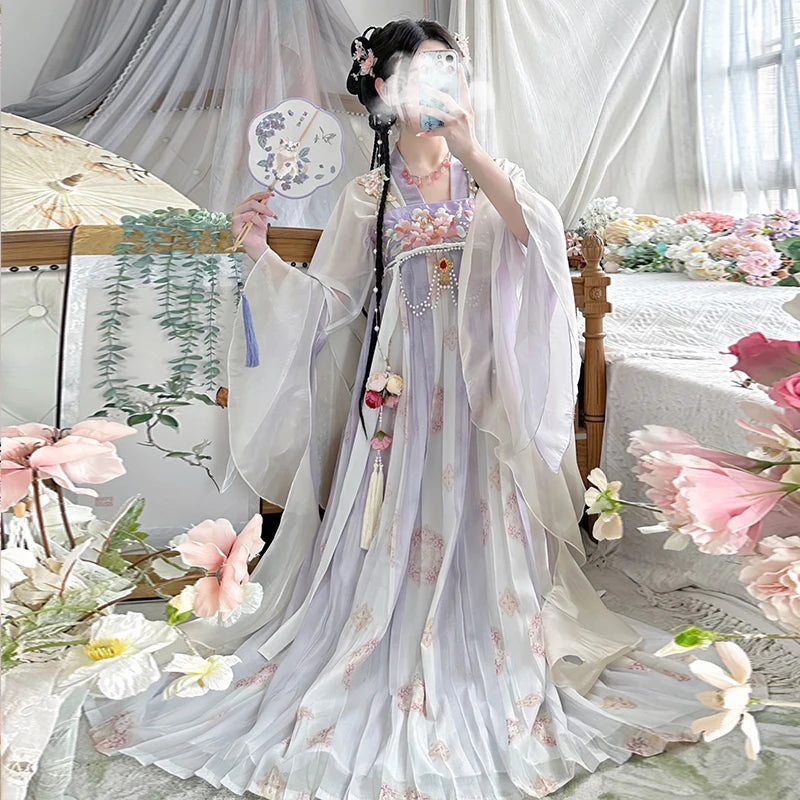 Vintage Chinese style traditional Hanfu dress featuring pastel colors and intricate floral designs, perfect for women.