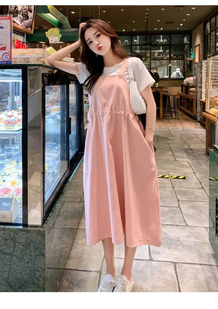 Korean loose fit maternity dress in pink, perfect for holiday photography, featuring pockets and a casual style.