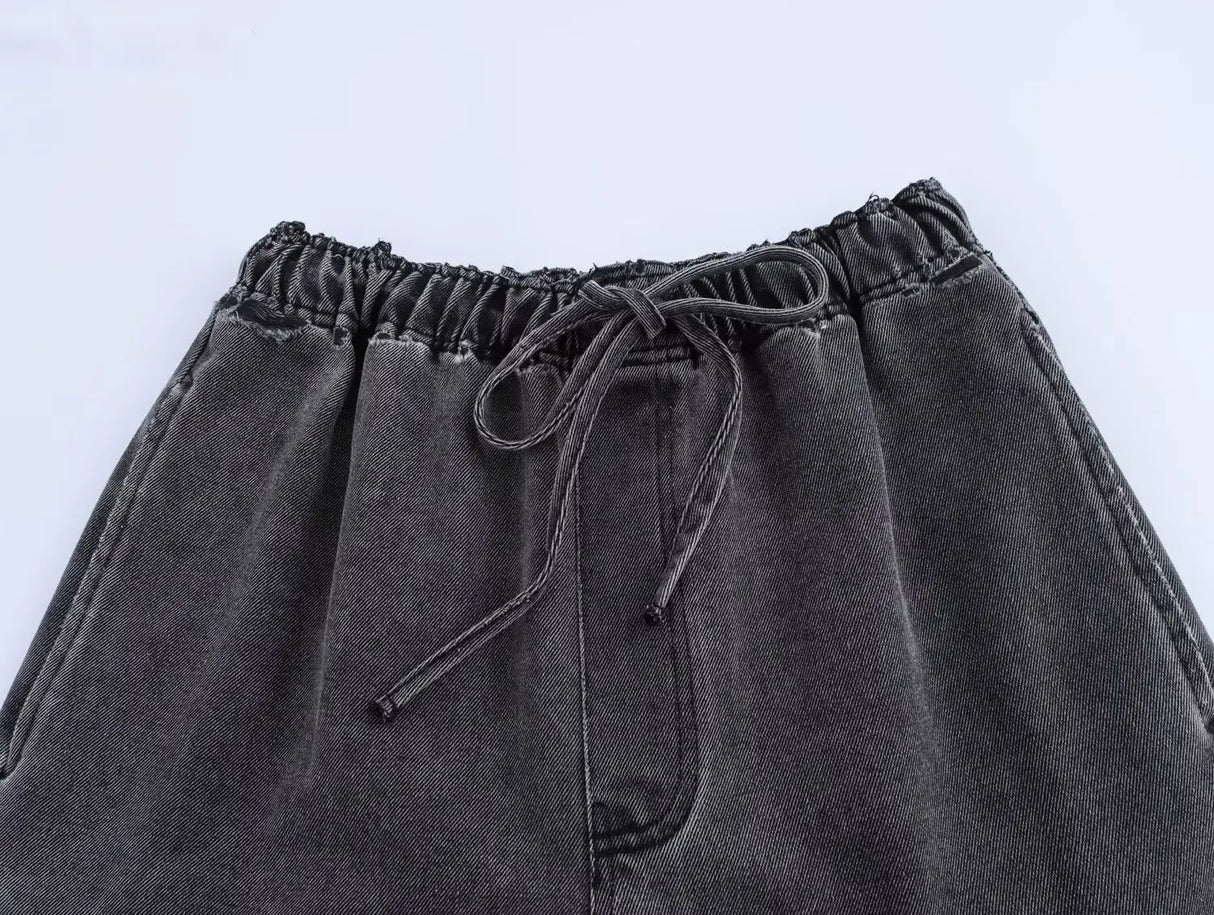 طقم بلوزة وبنطال جينز للنساء