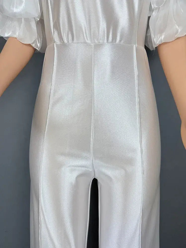 جمبسوت نسائي للحفلات بأكمام منتفخة من الساتان